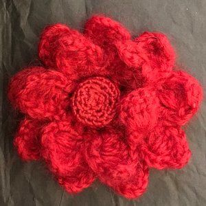Red handmade crocheted flower brooch pin